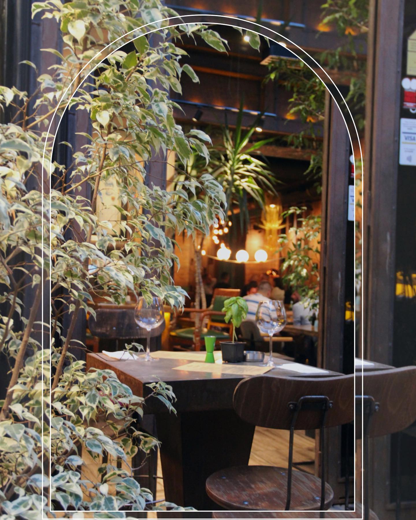 Garden room with plants and art